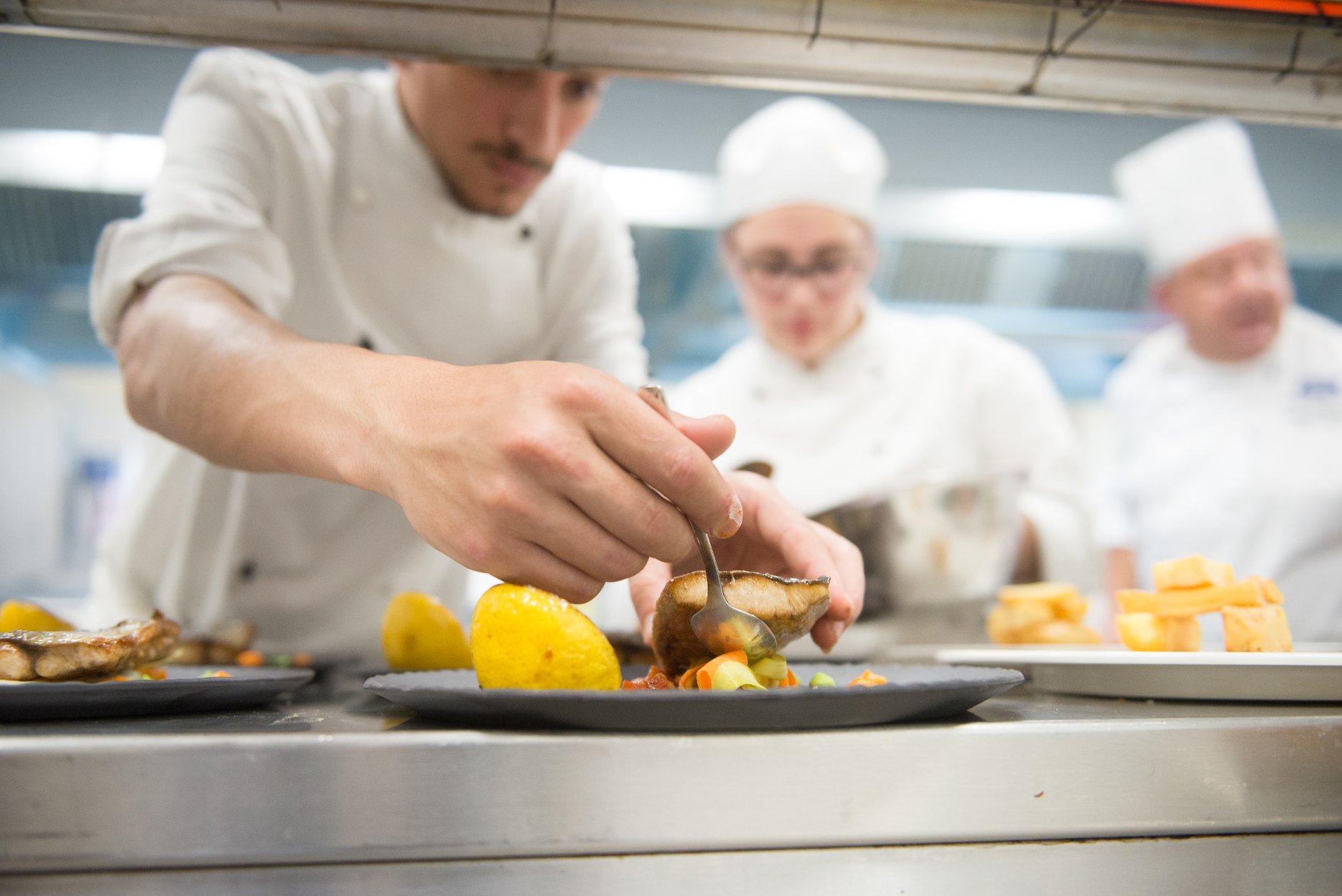 Cooking Skill - Chef plating a dish